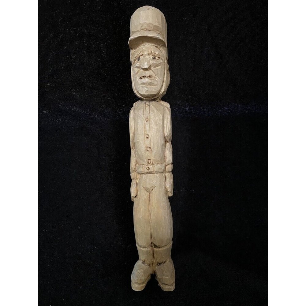 Hand Carved‎ wooden soldier signed and dated 95- 8 inches tall